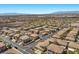 Expansive aerial view of a meticulously planned community with well-maintained homes and scenic mountain backdrop at 694 Value Ridge Ave, Henderson, NV 89012
