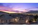 Enjoy stunning city views from this property with beautiful sunset skies in the background at 694 Value Ridge Ave, Henderson, NV 89012