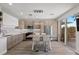 Well-designed kitchen with modern appliances, center island and a view of outdoor scenery at 694 Value Ridge Ave, Henderson, NV 89012