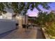 Inviting outdoor patio features a charming seating area and a barbecue, perfect for relaxation at 694 Value Ridge Ave, Henderson, NV 89012