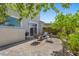 Inviting backyard patio with elegant wicker seating, great for outdoor dining and relaxation at 694 Value Ridge Ave, Henderson, NV 89012