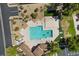 Community pool with plenty of seating and a well-maintained deck and landscaping at 694 Value Ridge Ave, Henderson, NV 89012