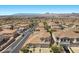 Lovely suburban street featuring well-maintained homes, manicured landscaping, and mountain backdrop at 694 Value Ridge Ave, Henderson, NV 89012