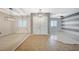 Open floor plan with tile, decorative ceiling fixture, neutral colors, and double door entry at 6971 Moaning Cavern St, Las Vegas, NV 89131