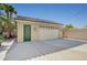 Large detached garage with an automatic door, side entry door and plenty of parking space at 6971 Moaning Cavern St, Las Vegas, NV 89131