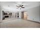Open living space with tile flooring leads to the kitchen and other areas of the home at 6971 Moaning Cavern St, Las Vegas, NV 89131