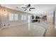 Open living space with access to the kitchen and sliding doors to the backyard at 6971 Moaning Cavern St, Las Vegas, NV 89131