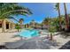 A custom pool and spa are surrounded by lush landscaping, creating a private retreat at 6971 Moaning Cavern St, Las Vegas, NV 89131