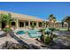 Backyard with a custom pool, spa, and covered patio, perfect for entertaining at 6971 Moaning Cavern St, Las Vegas, NV 89131