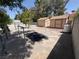 Backyard view features two storage sheds and gated access to the property at 7385 Severence Ln, Las Vegas, NV 89131