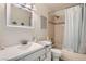 Cozy bathroom offers a vanity, toilet, and tub/shower combo at 7385 Severence Ln, Las Vegas, NV 89131