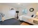 Comfortable bedroom with wood floors, lots of light, and modern decor at 7385 Severence Ln, Las Vegas, NV 89131