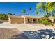 Beautiful desert home featuring an attached two-car garage and low-maintenance landscaping at 7385 Severence Ln, Las Vegas, NV 89131