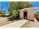 Backyard shed with concrete path and minimal landscaping at 744 Mcknight St, Las Vegas, NV 89101