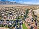 Panoramic aerial view of the neighborhood showcasing the beautiful desert landscape and mountain views at 8623 Kennedy Heights Ct, Las Vegas, NV 89131