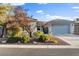 Charming single-story home featuring desert landscaping, a multi-car garage, and a cozy entrance at 8623 Kennedy Heights Ct, Las Vegas, NV 89131