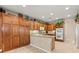 Fully equipped kitchen with granite countertops and decorative touches above the cabinets at 8623 Kennedy Heights Ct, Las Vegas, NV 89131
