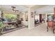 Open-concept living space showcasing the home office, dining area, and ample natural light at 8623 Kennedy Heights Ct, Las Vegas, NV 89131