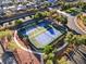 Aerial view of community tennis courts showcasing well-maintained blue and green playing surfaces at 8623 Kennedy Heights Ct, Las Vegas, NV 89131