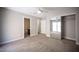 Bedroom featuring a closet with mirrored sliding doors and a connected bathroom at 9314 Hopcroft Ave, Las Vegas, NV 89178