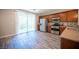 Modern kitchen with stainless steel appliances and sliding glass door leading to a balcony at 9314 Hopcroft Ave, Las Vegas, NV 89178