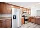 Well-equipped kitchen with stainless steel appliances, ample cabinet space and granite countertops at 9314 Hopcroft Ave, Las Vegas, NV 89178