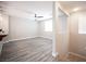 Spacious living room featuring modern flooring, a ceiling fan, and abundant natural light at 9314 Hopcroft Ave, Las Vegas, NV 89178