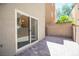 Private brick patio with sliding glass door access, perfect for outdoor relaxation and entertaining at 9314 Hopcroft Ave, Las Vegas, NV 89178