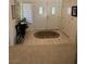 Bright foyer with tile flooring, double doors, and natural light from the window at 9505 Quail Ridge Dr, Las Vegas, NV 89134