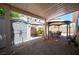 Covered patio with paver flooring, ample space for outdoor entertaining, and a storage shed at 9632 Spanish Steps Ln, Las Vegas, NV 89117
