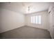 Bright bedroom with a ceiling fan, a window with shutters, and a large closet at 9728 Drumcannon Ave, Las Vegas, NV 89129