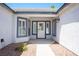 Inviting front entrance with stylish windows and a decorative front door at 9728 Drumcannon Ave, Las Vegas, NV 89129