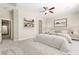 This bedroom features ample space and a cozy king size bed at 10348 Hawks Wing St, Las Vegas, NV 89178