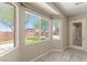 Bedroom with bay window offers views of backyard, including putting green at 10348 Hawks Wing St, Las Vegas, NV 89178