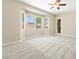 Bright bedroom with bay windows offering neighborhood views and natural light at 10348 Hawks Wing St, Las Vegas, NV 89178