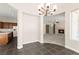 Open-concept design with dining area connecting the kitchen and living room, promoting seamless entertaining at 10348 Hawks Wing St, Las Vegas, NV 89178