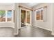 Bright dining area with many windows offering natural light and backyard views at 10348 Hawks Wing St, Las Vegas, NV 89178