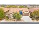 Attractive single-story home with a well-kept yard and a convenient two-car garage at 10348 Hawks Wing St, Las Vegas, NV 89178