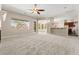 Spacious living room featuring an open layout with backyard views at 10348 Hawks Wing St, Las Vegas, NV 89178