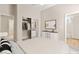 Nicely staged main bedroom with a comfortable bed, closet, and an ensuite bathroom at 10348 Hawks Wing St, Las Vegas, NV 89178