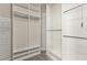 Spacious walk-in closet with custom shelving for optimal storage and organization at 10348 Hawks Wing St, Las Vegas, NV 89178
