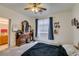 Bedroom with carpeted floors, ceiling fan, and a dresser at 1110 Orchard Valley Dr, Las Vegas, NV 89142