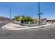 Single-story home on a corner lot with manicured landscaping and a two-car garage at 1110 Orchard Valley Dr, Las Vegas, NV 89142
