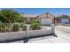 Single-story home with well-manicured front yard and attached two-car garage at 1110 Orchard Valley Dr, Las Vegas, NV 89142