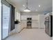 The kitchen features a stainless steel oven and microwave, and white cabinets at 1110 Orchard Valley Dr, Las Vegas, NV 89142