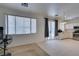 Open concept kitchen area featuring stainless steel appliances, white cabinets and tile flooring at 1110 Orchard Valley Dr, Las Vegas, NV 89142