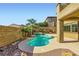 Enjoy the pool and spa in a beautifully landscaped backyard with views of the neighborhood at 1178 Yellow Orchid St, Henderson, NV 89002