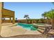 The refreshing pool and spa with palm trees create the perfect outdoor entertainment spot at 1178 Yellow Orchid St, Henderson, NV 89002