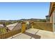 Relax on this sunny balcony with scenic views and stucco privacy wall at 1178 Yellow Orchid St, Henderson, NV 89002