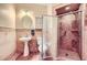 Bathroom featuring a single sink, shower, and toilet at 1178 Yellow Orchid St, Henderson, NV 89002